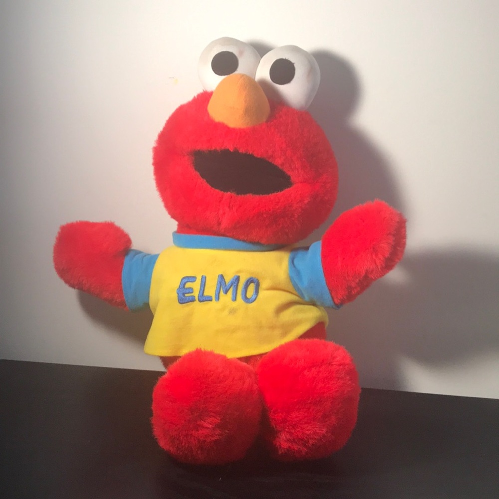 Tyco, 1997 Toss and Tickle Elmo plush with yellow embroidered shirt.